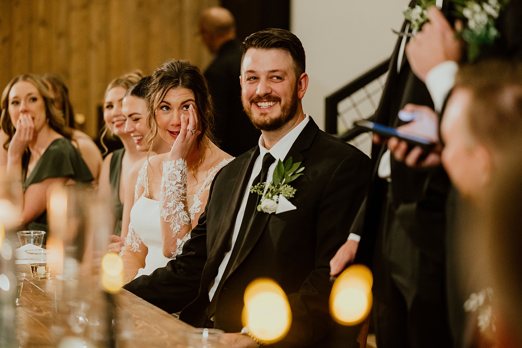 emotional bride and groom at reception that is running smoothly