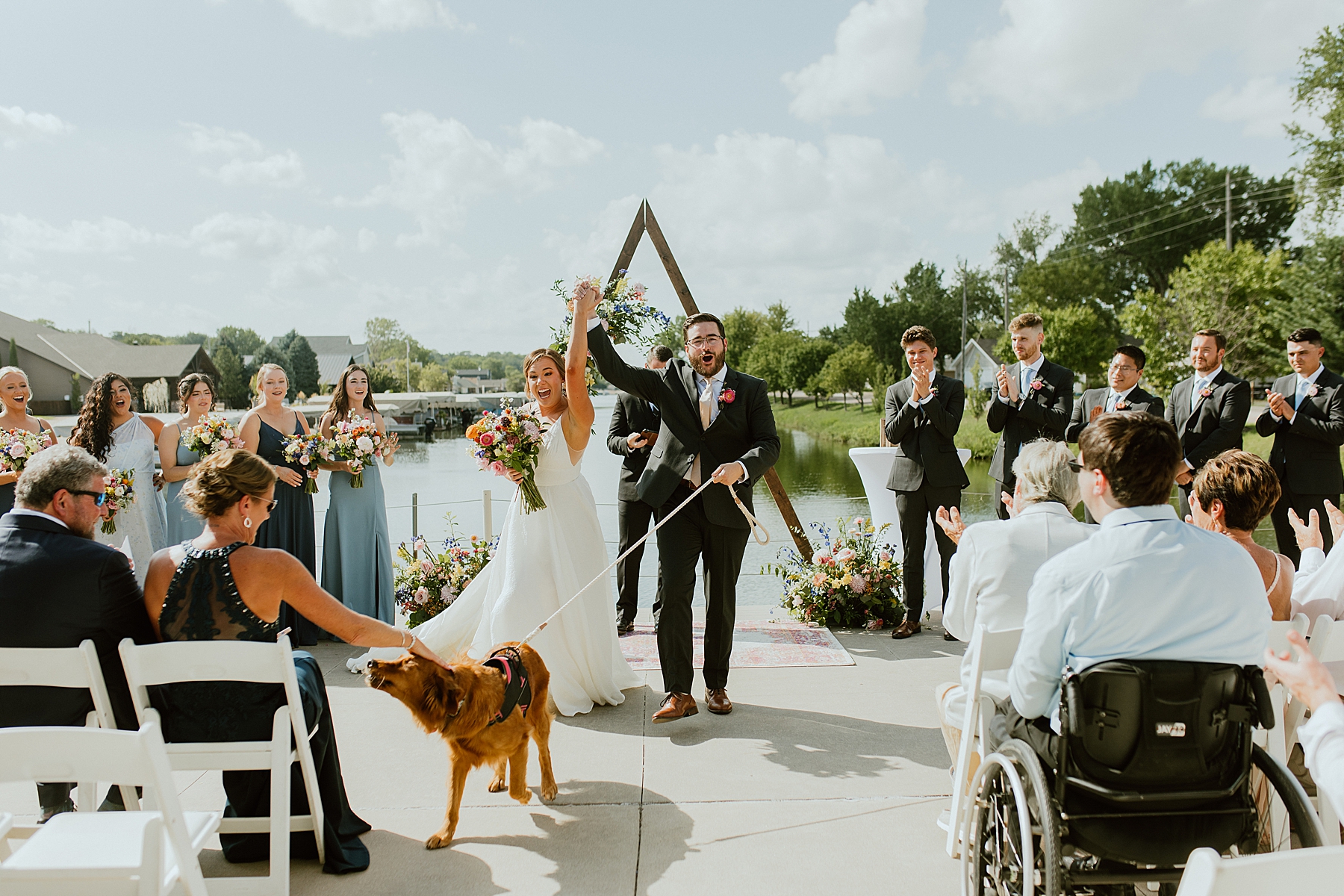 fairy tale wedding bride and groom lakeside with beautiful flowers and blooms