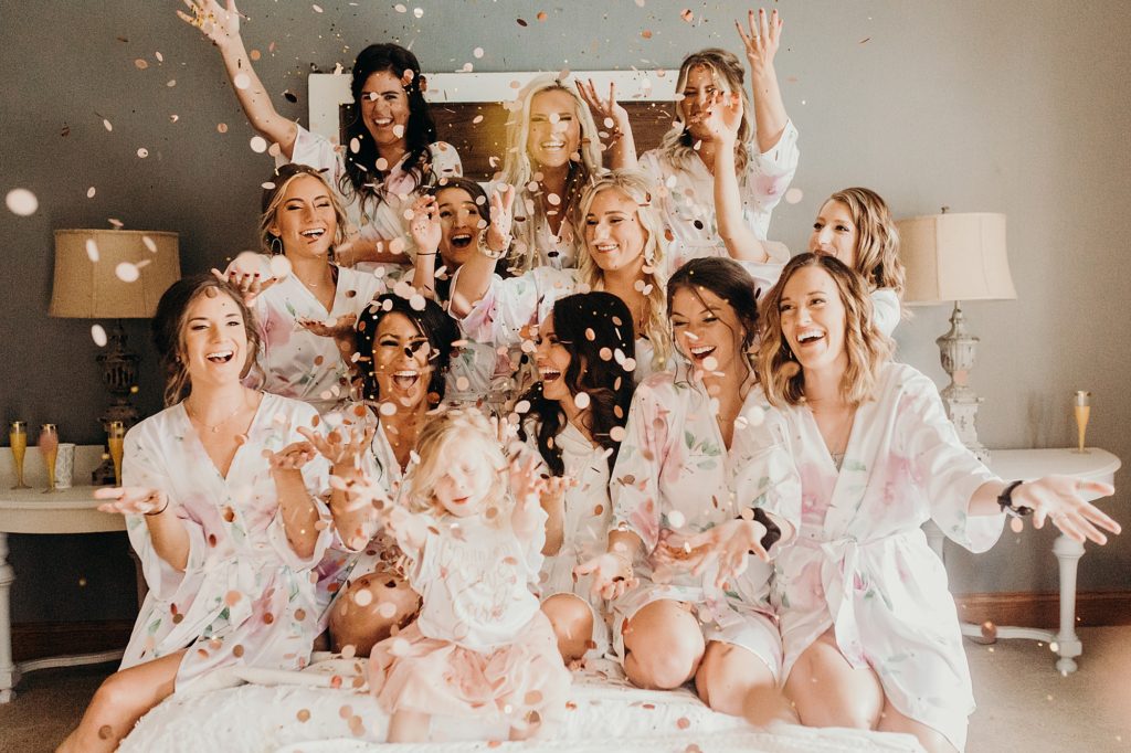 epic bridal party photos with flower petals